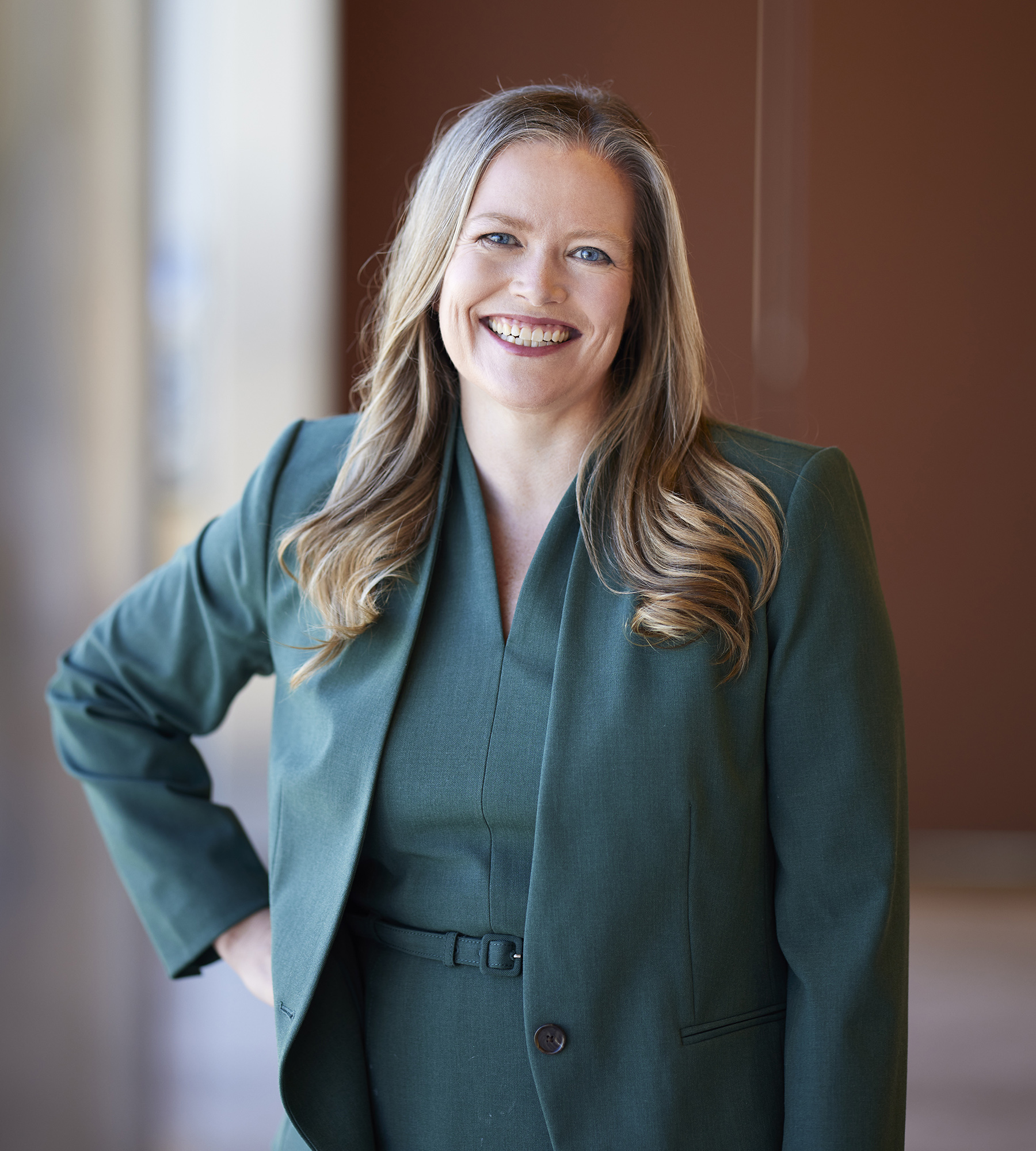 Photo of Megan Poetzel standing in an office